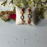 Gold Plated Diamond Stone Studded & Pearl Couple Rakhi