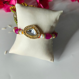 Handcrafted Gold Plated Kundan Studded & Pink Bead Rakhi